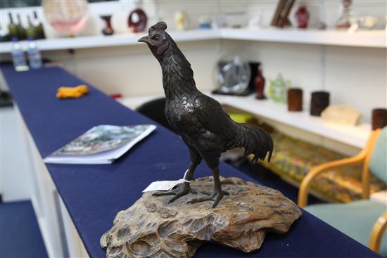 A Japanese bronze model of a cockerel, Meiji period, total height 39cm, loss to one tail feather